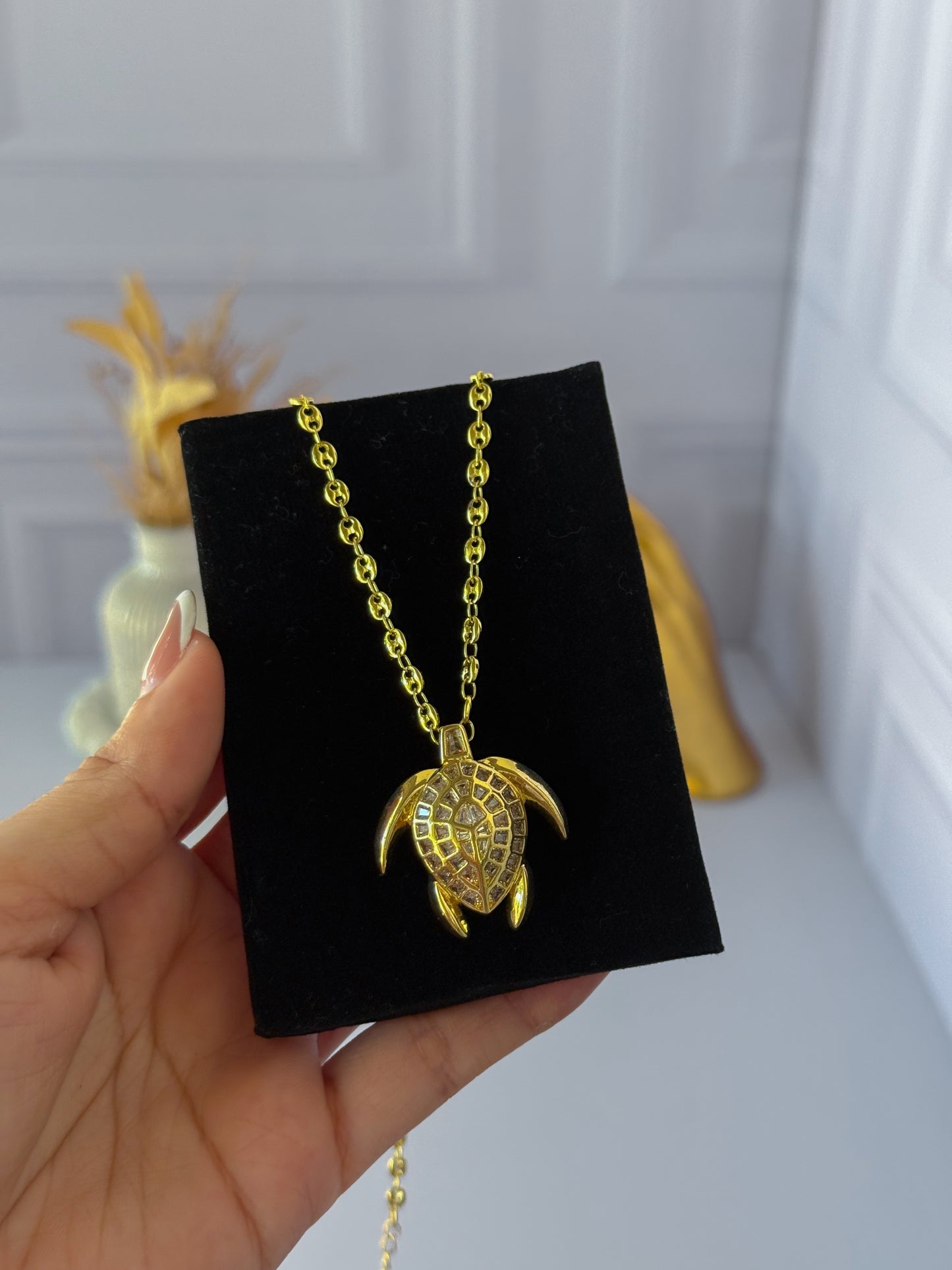 Cadena tortuga tejido Gucci