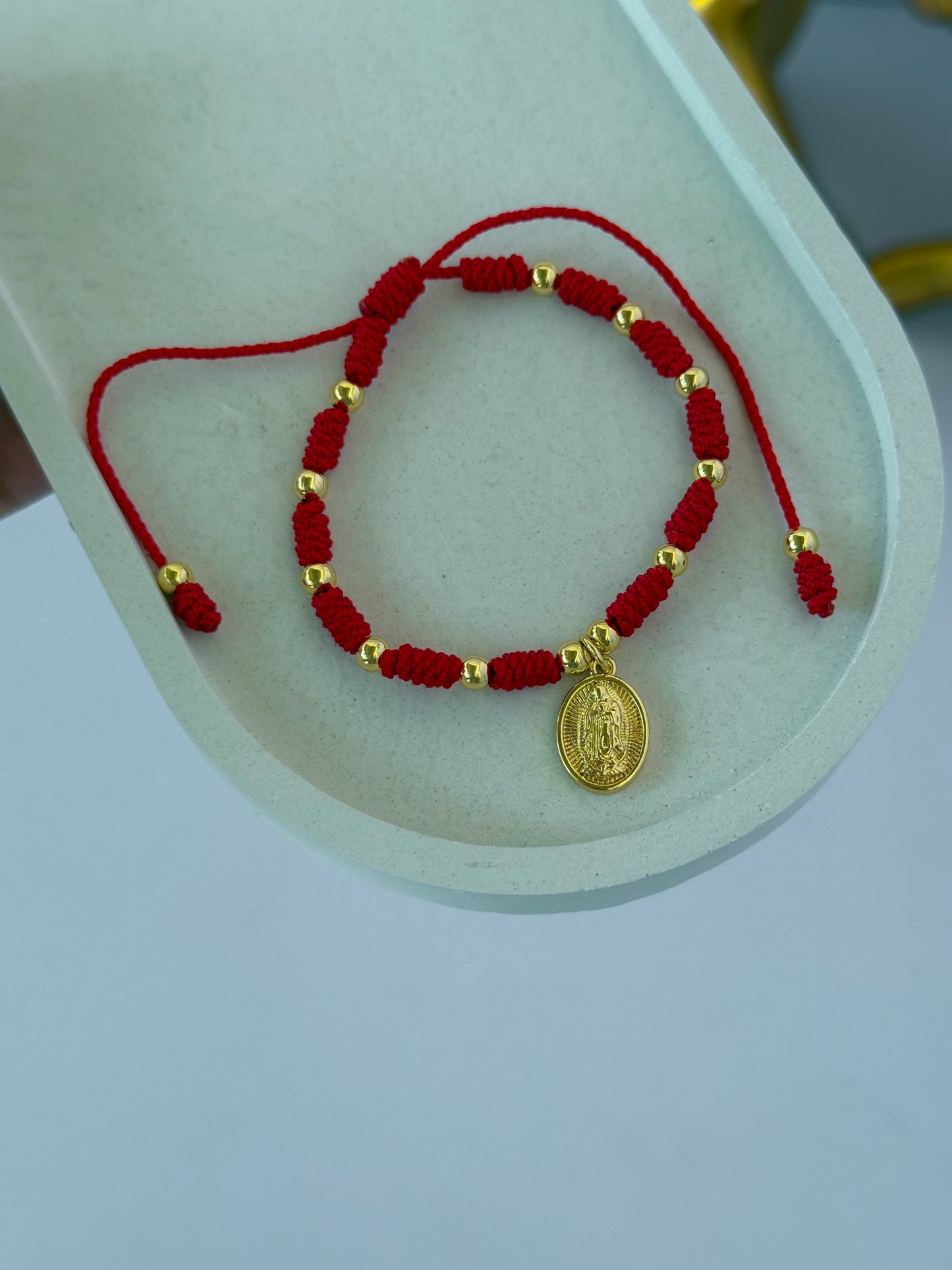 Pulsera tejida virgencita nudo