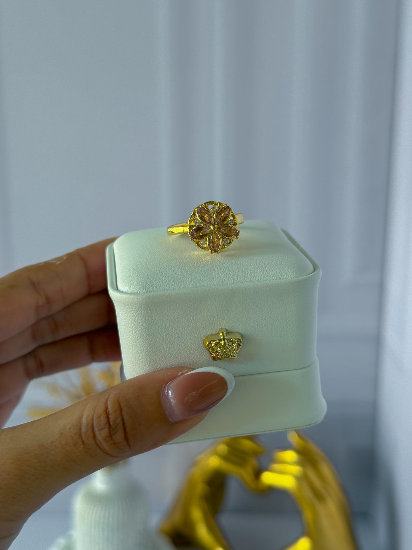 Anillo flor giratoria rosada