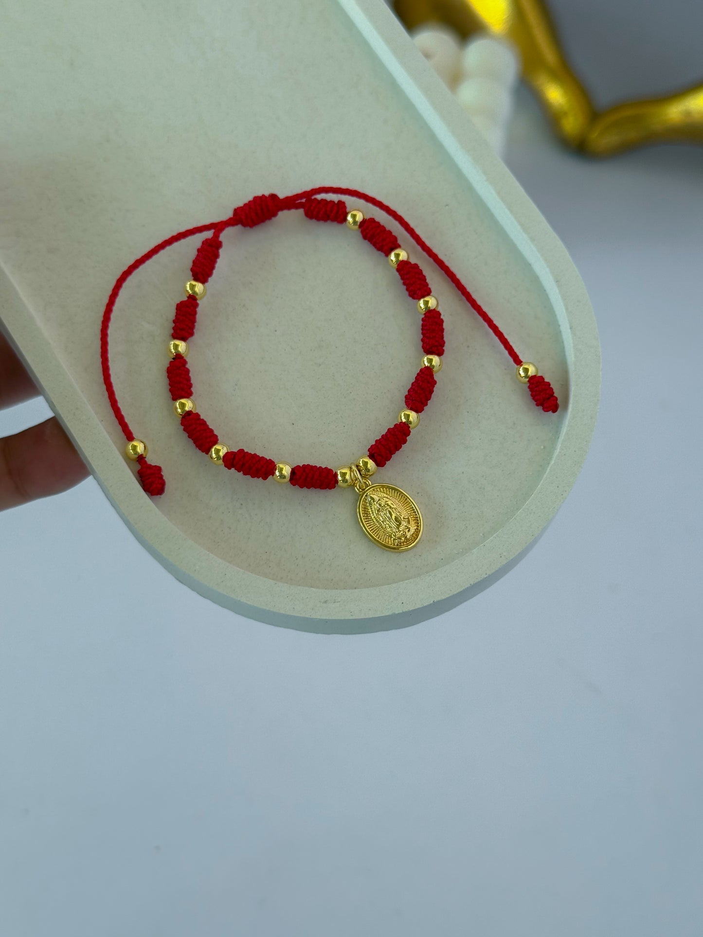 Pulsera tejida virgencita nudo