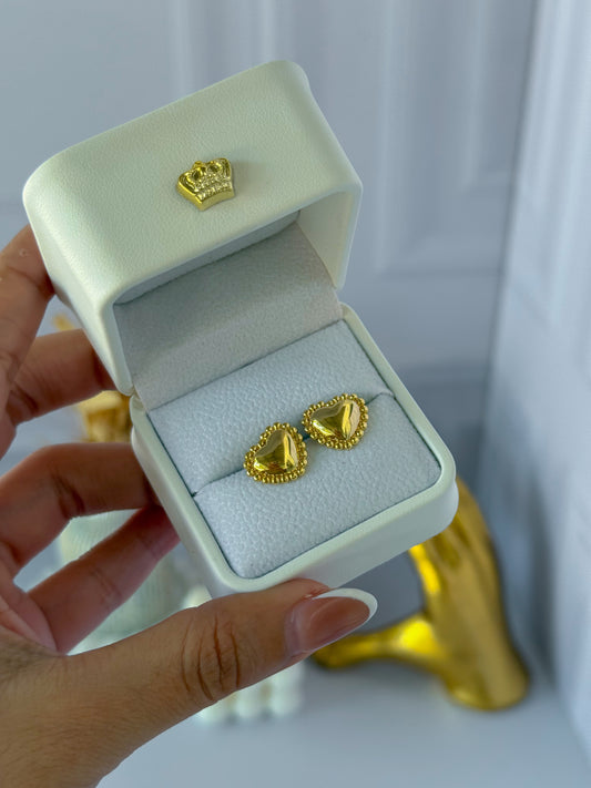 Topo corazón dorado