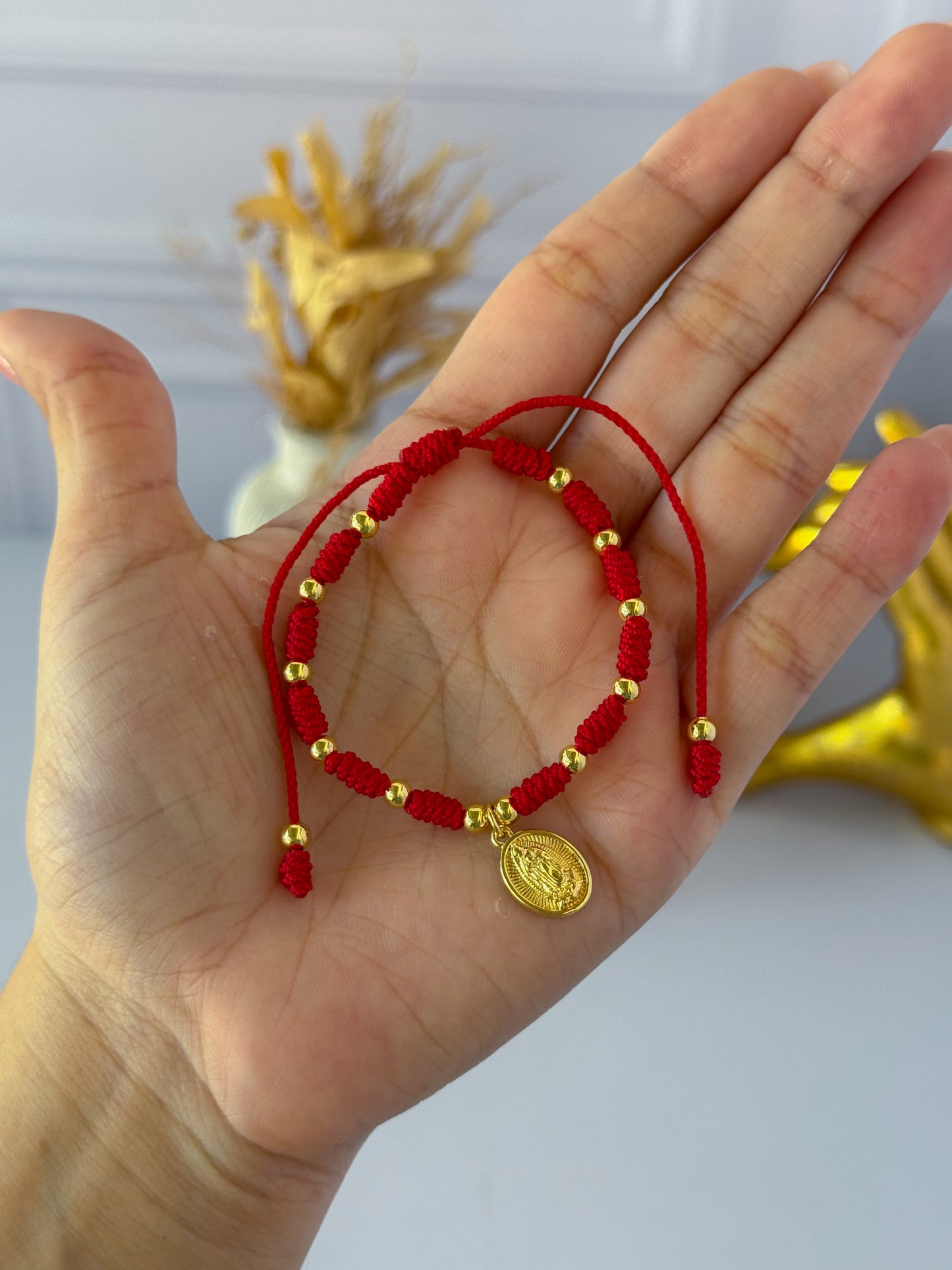 Pulsera tejida virgencita nudo