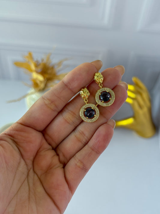 Topos círculo piedras moradas