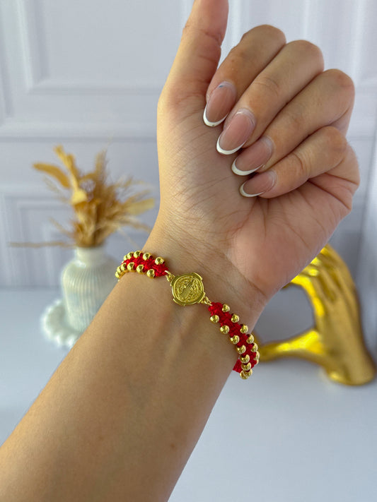Pulsera san Benito tejida